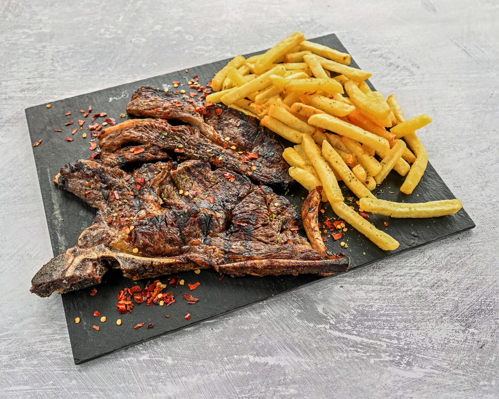 T-bone steak with chips